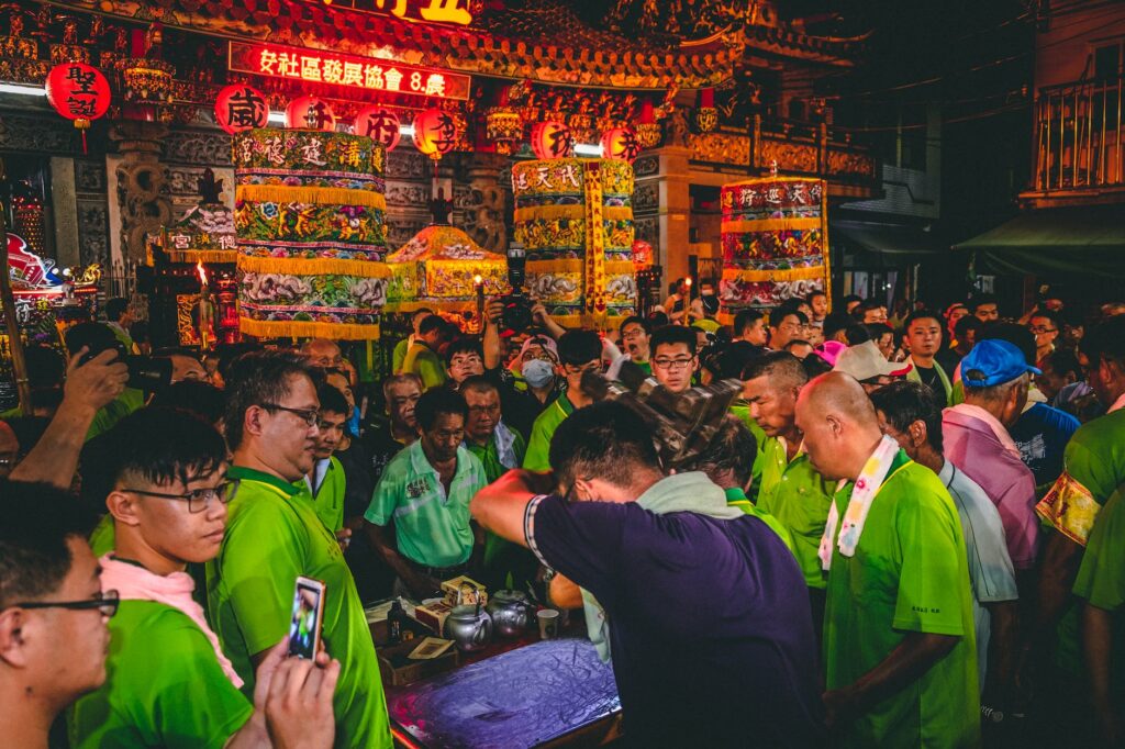 people in the street having a traditional celebration